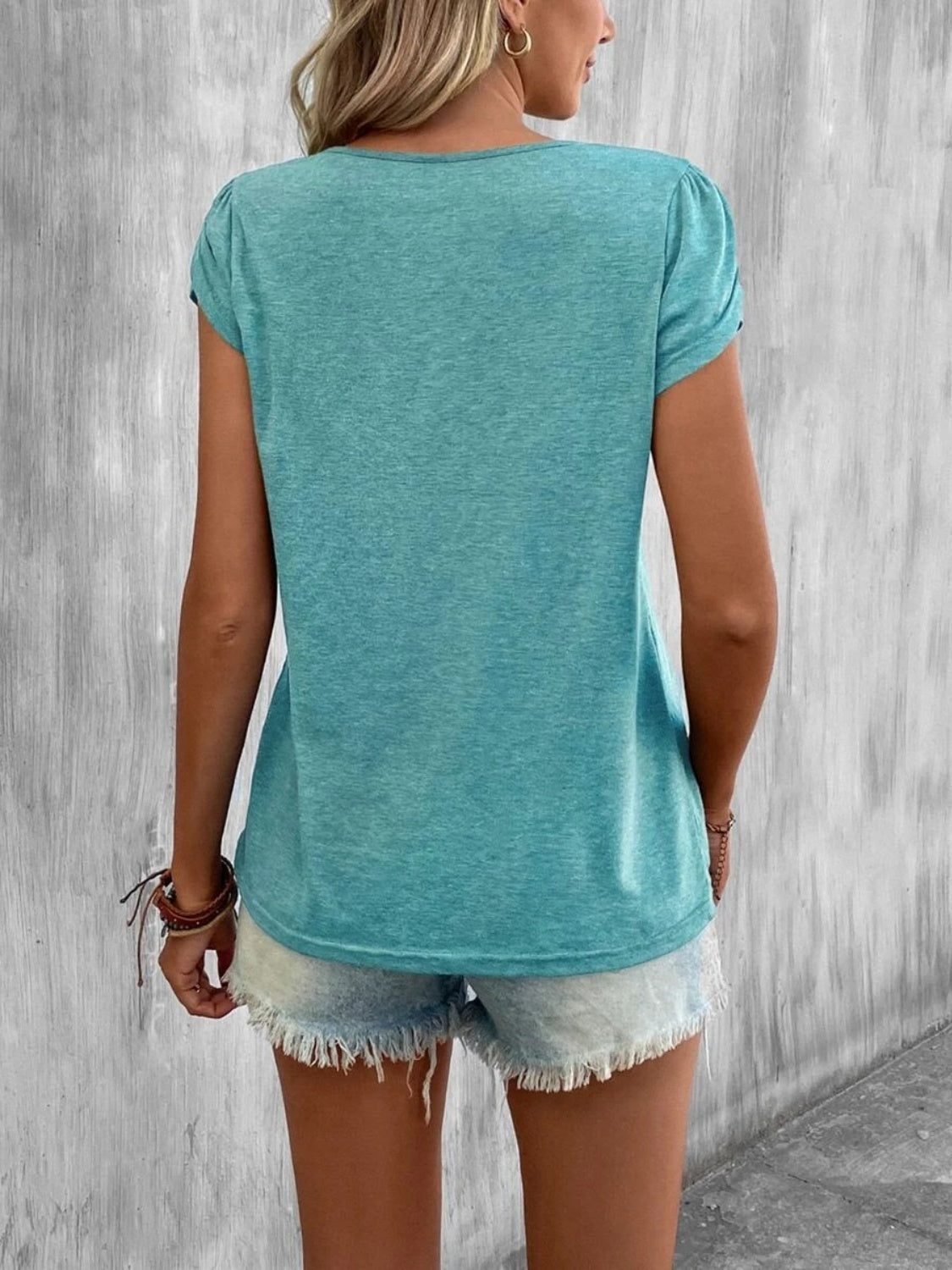 Ariana® | Asymmetrical T-shirt with petal sleeves
