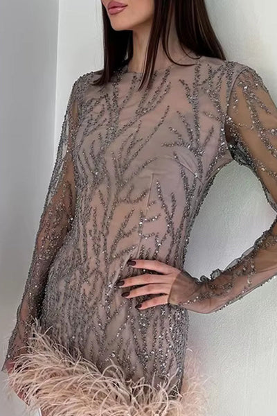 Elvira® | Elegant mini dresses with O-neck and tinsel feather hem in mesh fabric