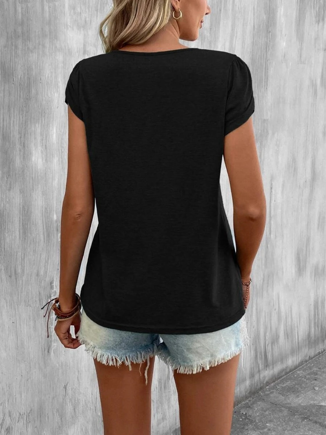 Ariana® | Asymmetrical T-shirt with petal sleeves