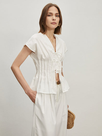 Amira® | Pleated Cotton Blouse With Knots