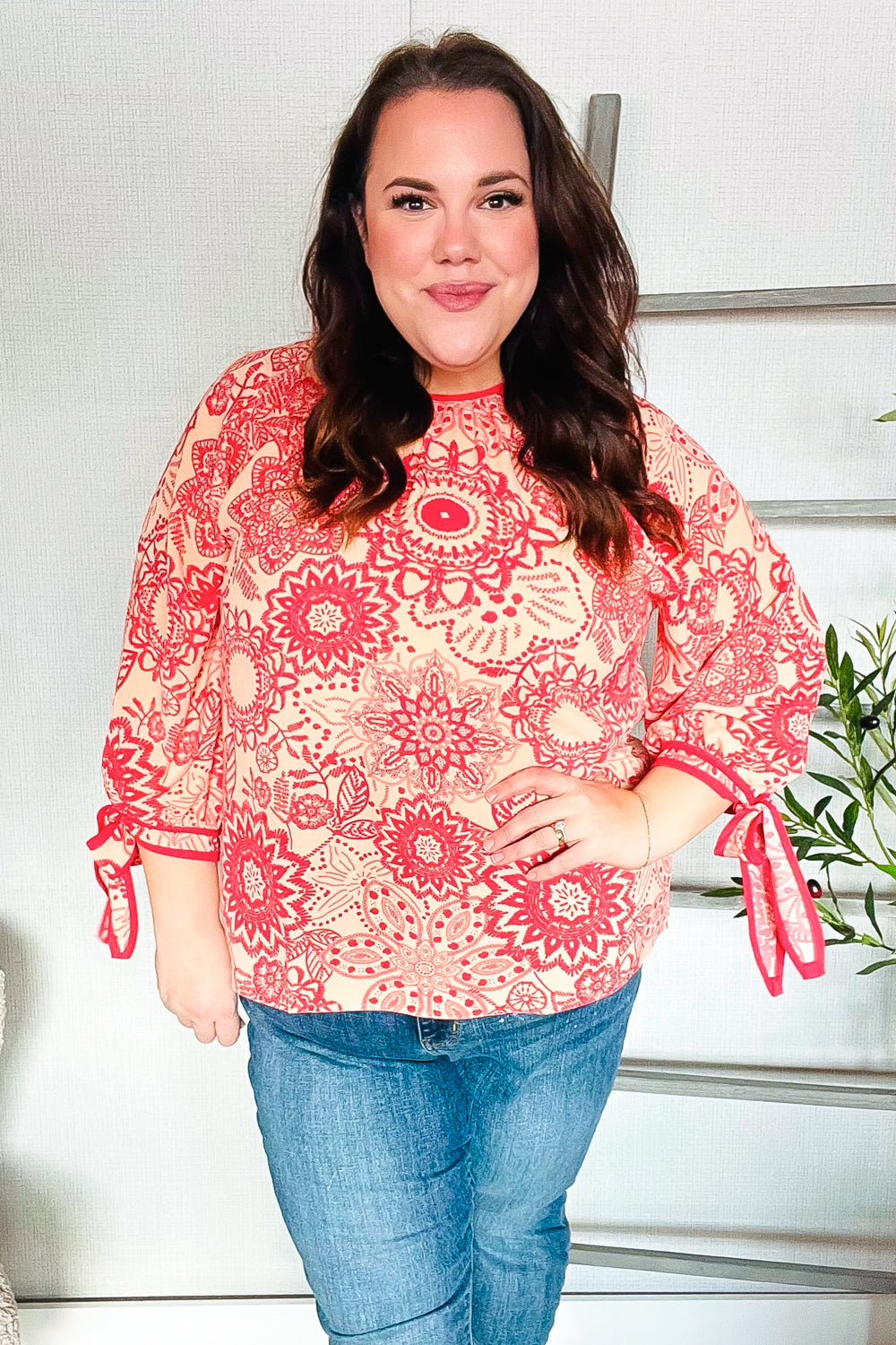 Macarena® | Long sleeve top with bow tie and contrast floral print in red and coral