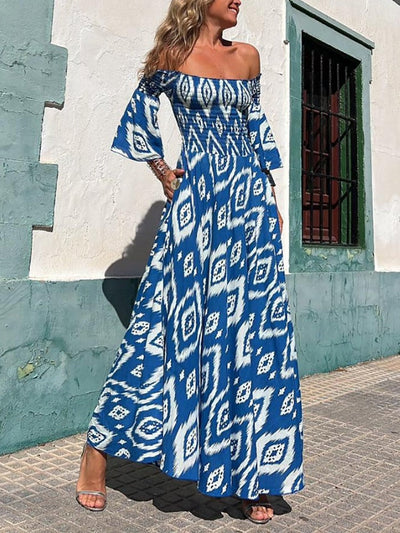 Madeline® | Smocked, off-the-shoulder maxi dress with ethnic print and pockets