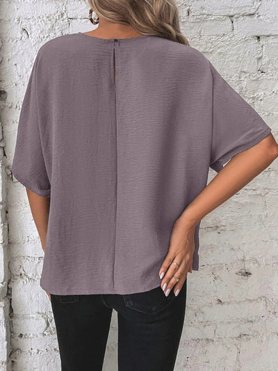 Alejandra® | Knotted, mid-length blouse with a round neckline
