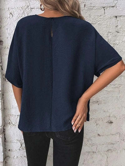 Alejandra® | Knotted, mid-length blouse with a round neckline