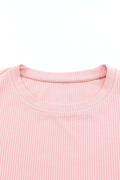 Angeline's® | Ruffled blouse with a round neckline and cap sleeves